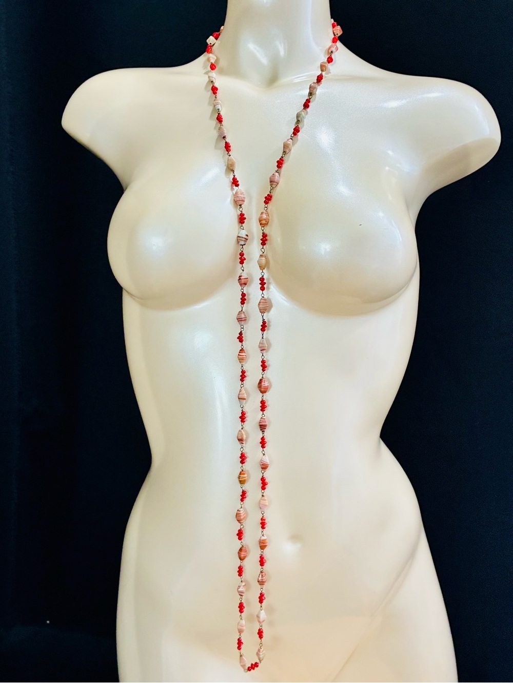 Handcrafted Long Swirl Glass Beaded Necklace – Red & Coral Toned Over The Head